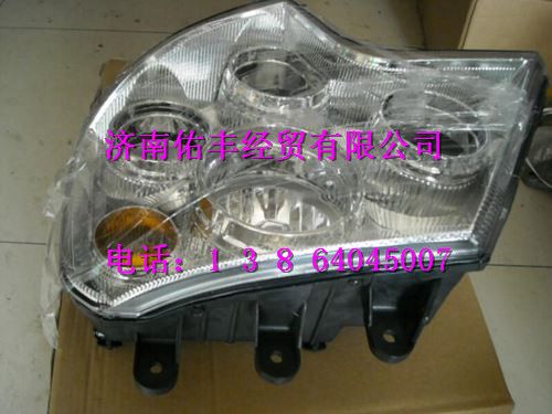 重汽豪沃A7前照灯总成左WG9925720001