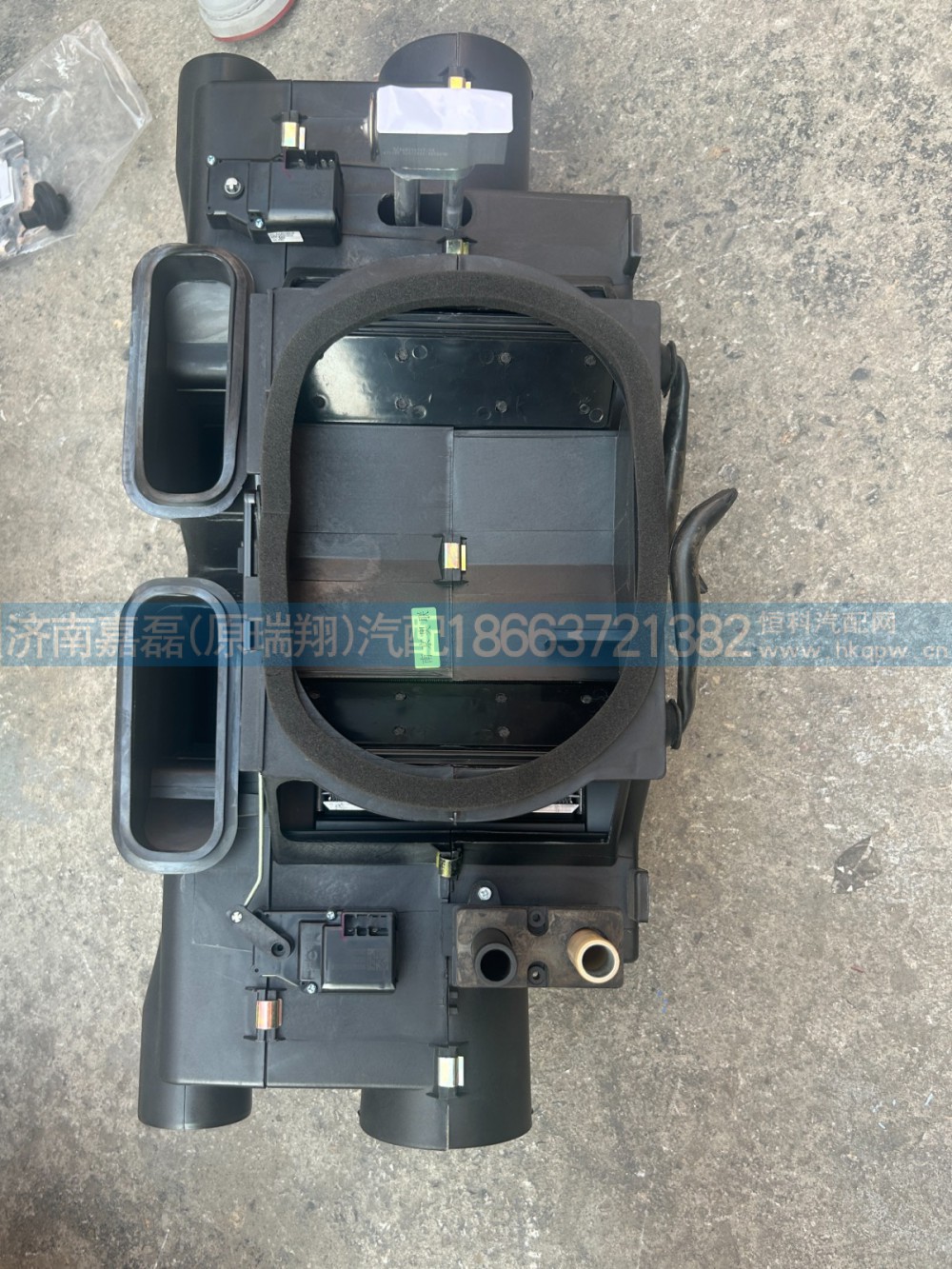 WG1642821060,暖风机总成（外置水阀）,济南嘉磊汽车配件有限公司(原济南瑞翔)